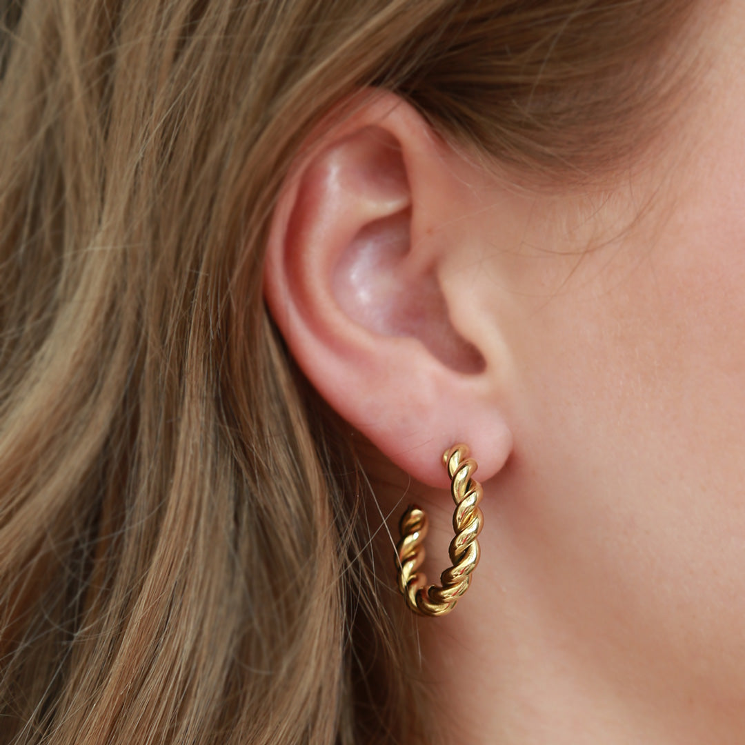 Gold earrings twisted hoops