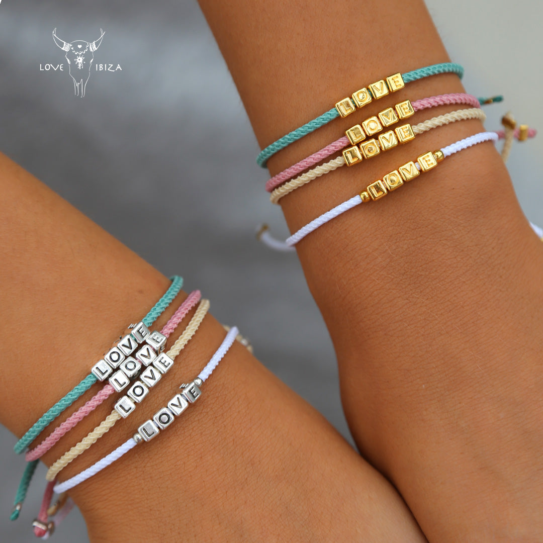 Le bracelet love argent blanc