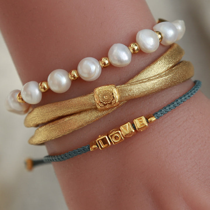 The love bracelet dusty blue gold